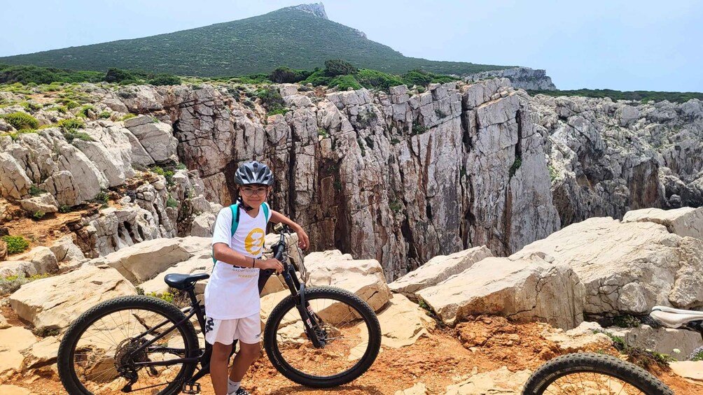 Picture 2 for Activity From Alghero: Le Prigionette Oasis Guided E-Bike Tour