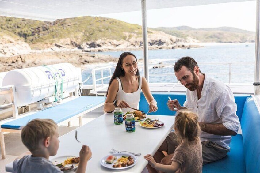 Savouring an Aussie-style BBQ lunch on the Adventure Cruise: A taste of Australian hospitality.