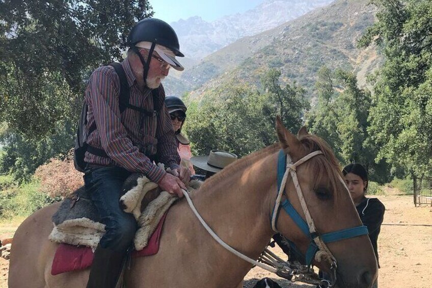 From Santiago to the Andes: 4x4, horseback riding, waterfall visit and barbecue