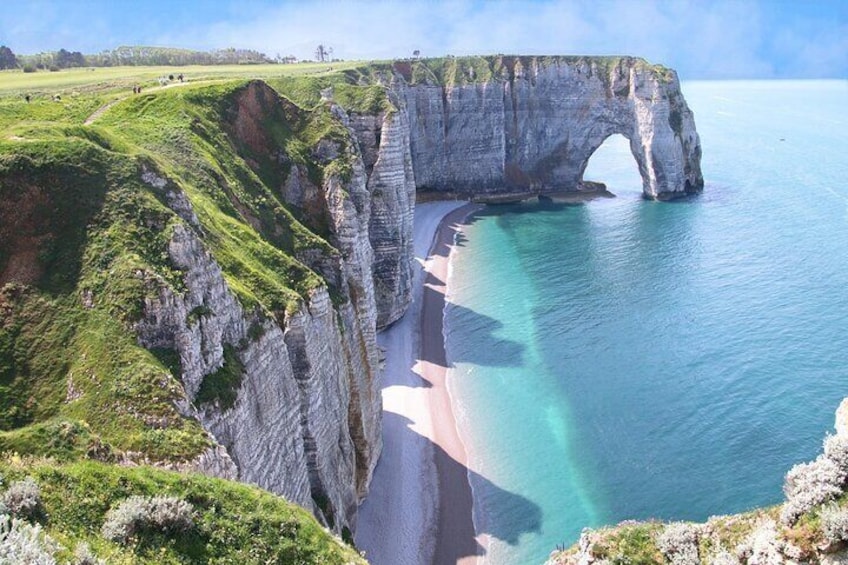 The Aval cliff (left) in the shape of an arch, Etretat Normandy