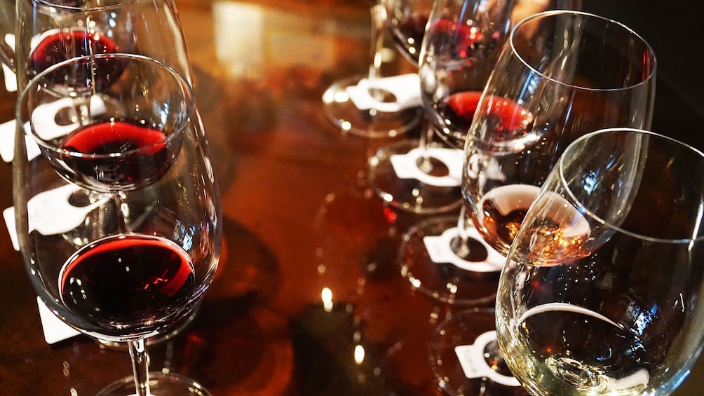 Show item 2 of 8. Glasses of wine during cooking class near Alghero