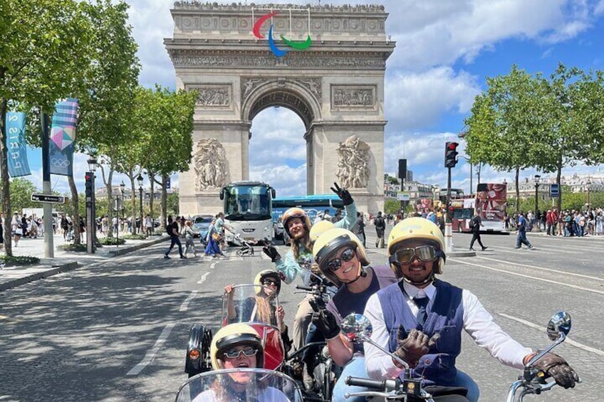 Cruising down the Champs Elysées on a sidecar tour!