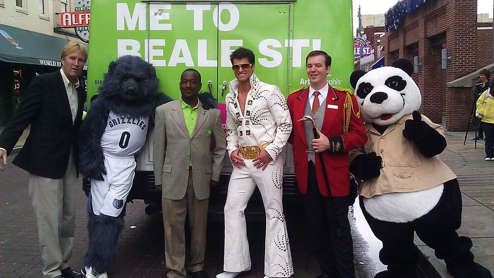 Different icons and mascots of Memphis outside of tour bus