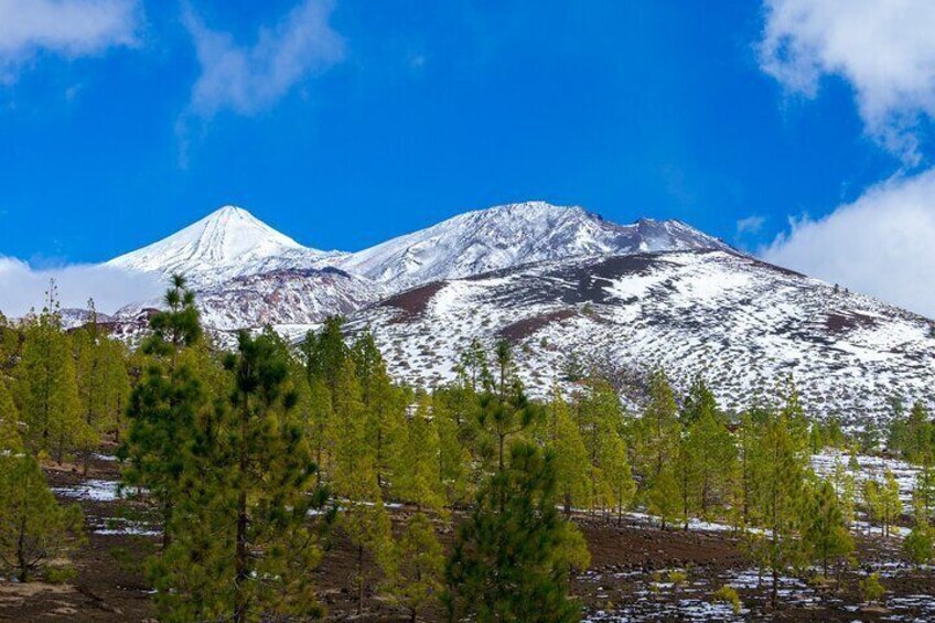 Sometimes it snows and you can see the white peaks.