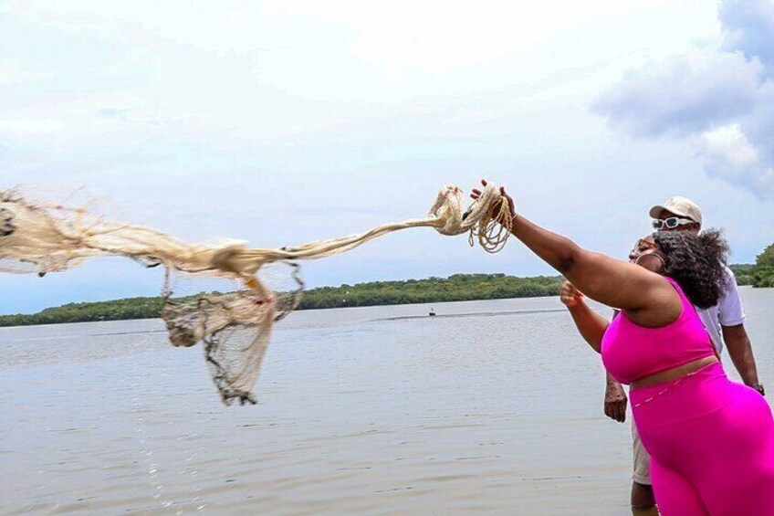 Typical lunch on the beach, mangrove ecotour and fishing with natives