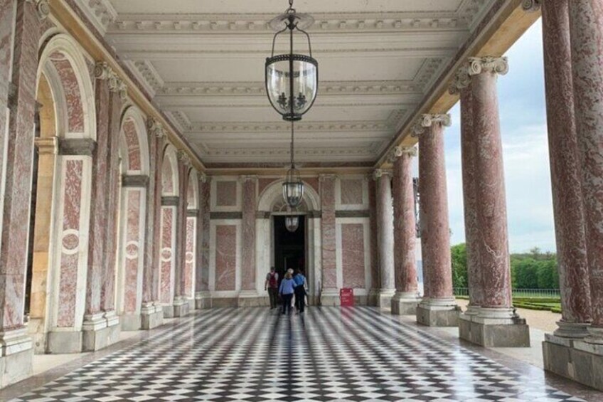 Wander around the Grand Trianon, a French Baroque style chateau found tucked away in the gardens