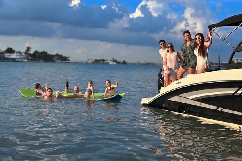 Family enjoying our Floating Mat
