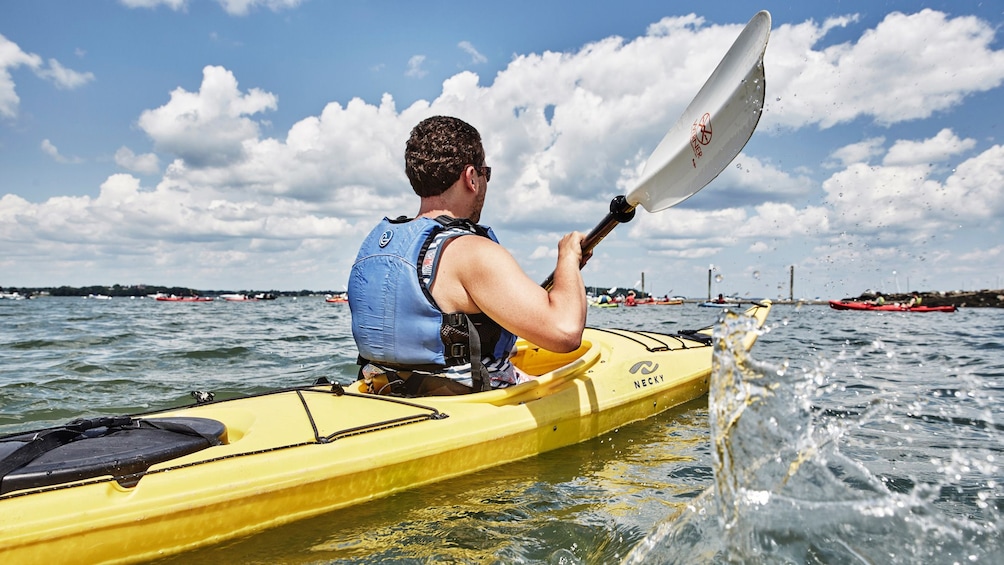 Kayaking man in Casco Bay in Portland