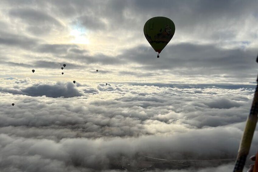 Hot air balloon flight in the desert with camel ride