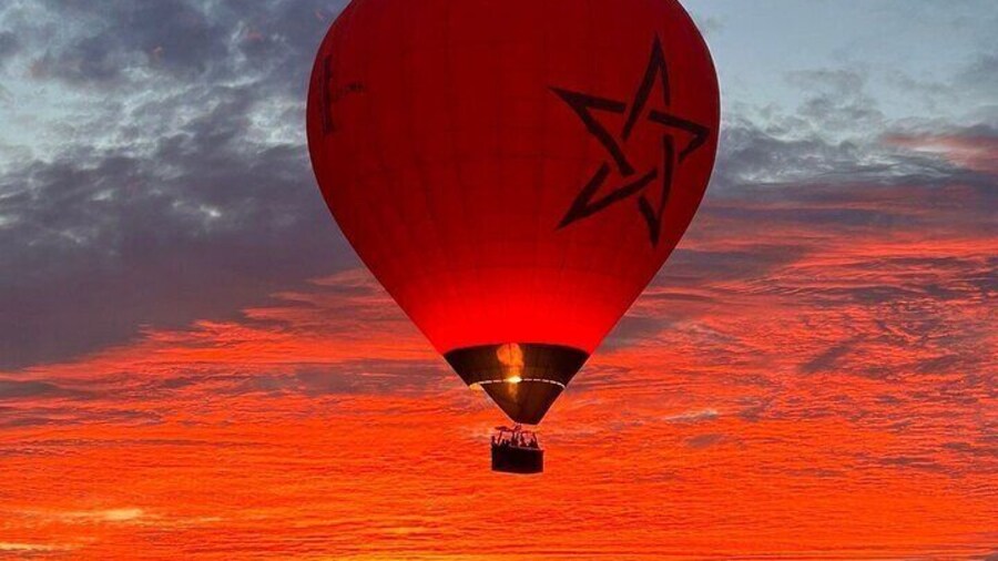 Sunrise aboard our special Moroccan flag hot air balloon