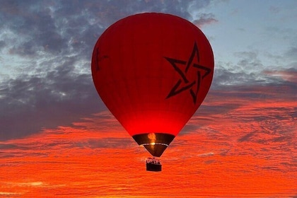 Hot air balloon flight in the desert with camel ride