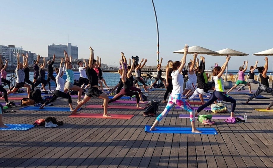 Picture 5 for Activity Tel Aviv: Beachfront Sunset Yoga at Beach Club TLV