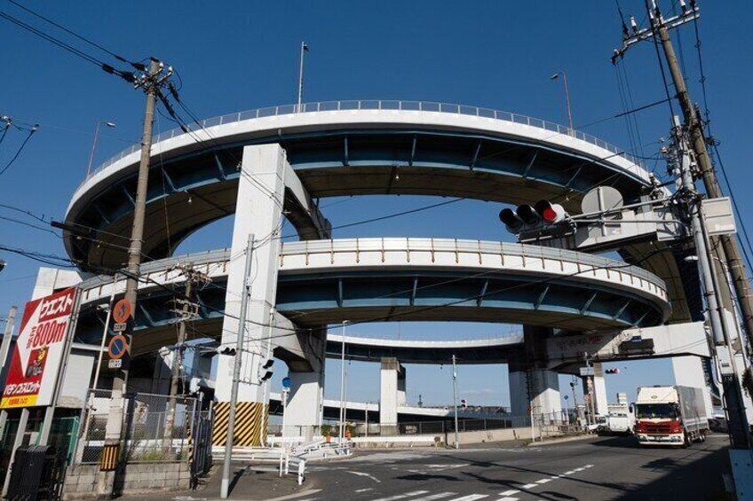 It is the most unique bridge in Osaka. It is nicknamed "Megane-bashi" (glasses bridge) by the locals because its shape resembles a pair of glasses.