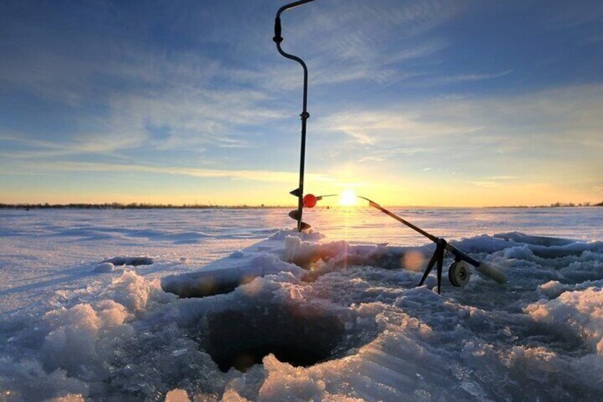 Half-day Ice Fishing Adventure in Lapland with Salmon Soup