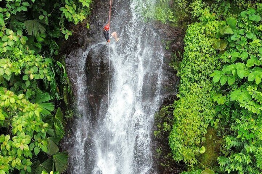 Canyoning Adventure Rappelling Waterfalls in Arenal Volcano