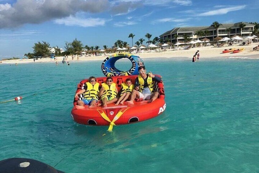 Tubing on grace bay beach Turks and caicos islands