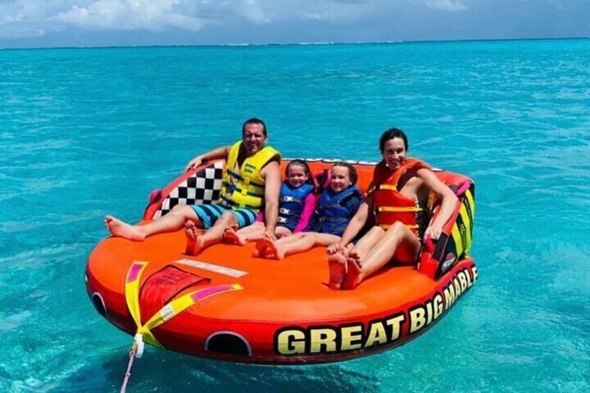 Tubing on grace bay beach Turks and caicos islands