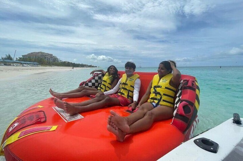 Tubing on grace bay beach Turks and caicos islands