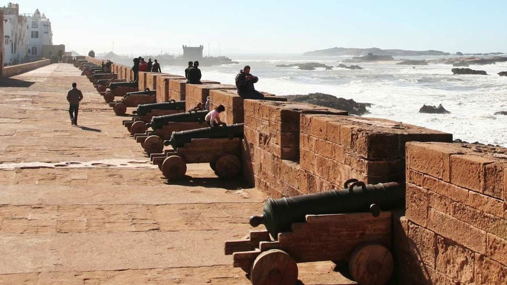 View if fortress wall with historical cannons in Essaouira