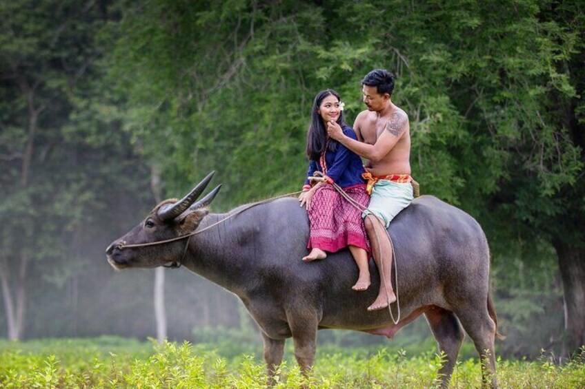 Riding a carabao