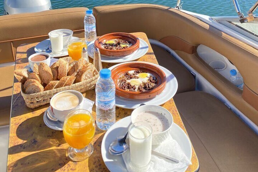Enjoying Moroccan breakfast in the boat and with the best view from the river 