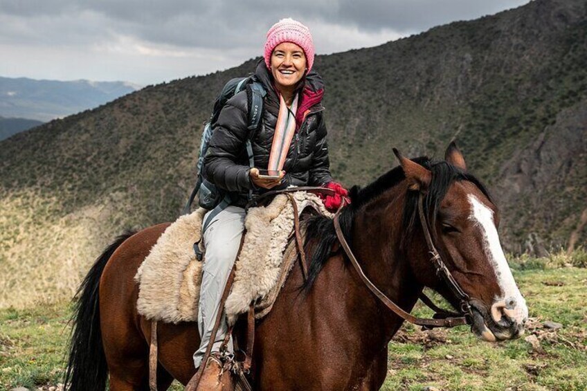 Horseback riding at sunset in the Andes