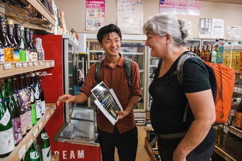 A guide explains how to select sake at a local liquor store.