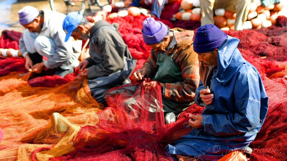 Men making fishing nets 