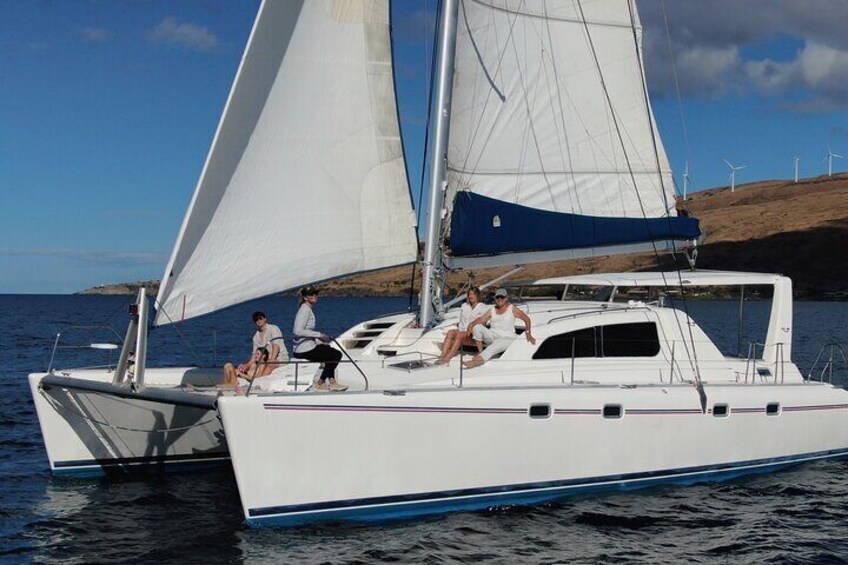 Full sail catamaran private charter.