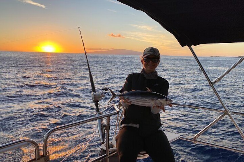 Sunset bite while fishing off of a sailing boat on Maui
