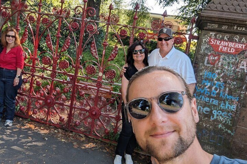 Exploring "Strawberry Field" with a tour.