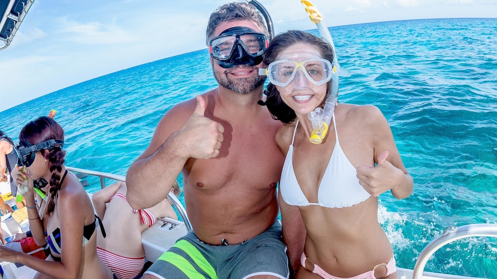 Couple getting ready to snorkel in Turks and Caicos