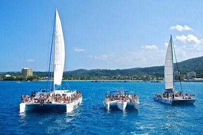 Exotic Catamaran Party Cruise and Snorkelling to Dunns River Falls