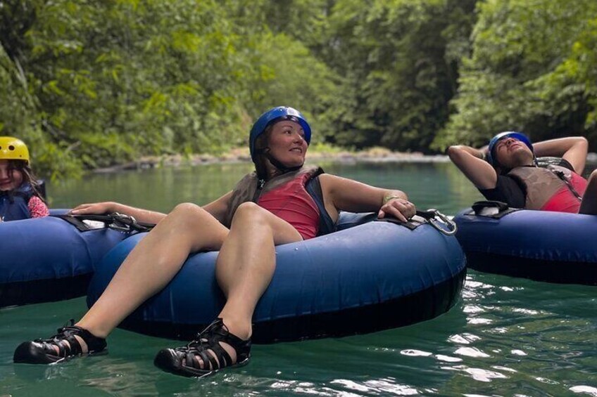 Tubing adventure through the clear waters of the Río Celeste
