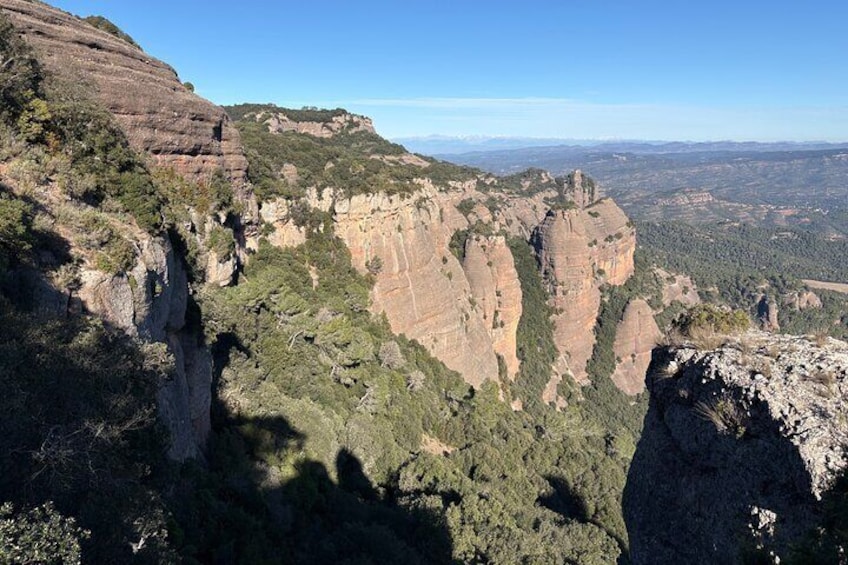 From Barcelona: Hiking in the mountain with caves, cliffs