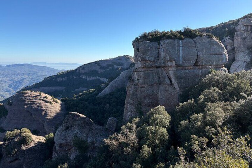 From Barcelona: Hiking in the mountain with caves, cliffs