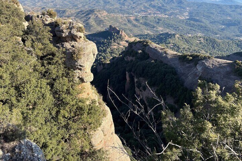 From Barcelona: Hiking in the mountain with caves, cliffs