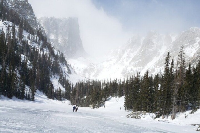 Walking across a frozen lake on the way to Emerald Lake in Rocky Mountain National Park.