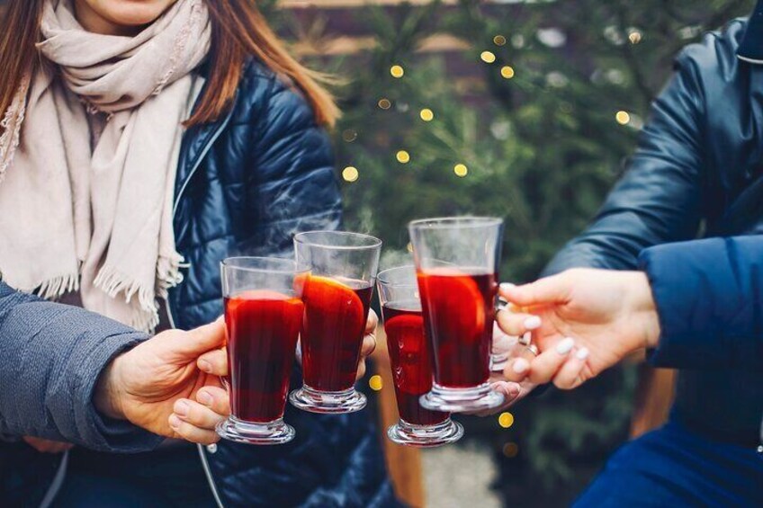 In mulled wine Veritas warming old town walk in Freiburg