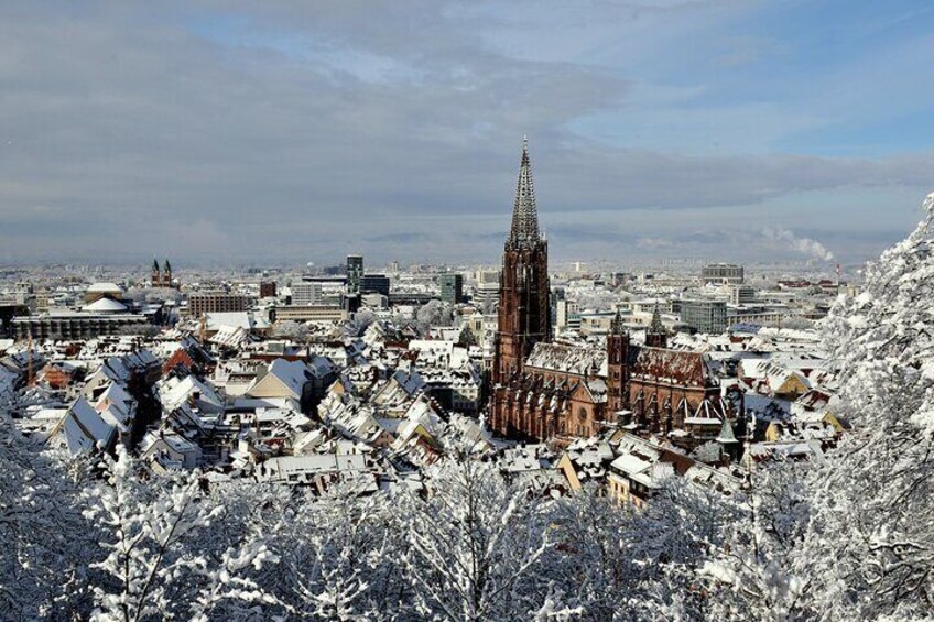 In mulled wine Veritas warming old town walk in Freiburg