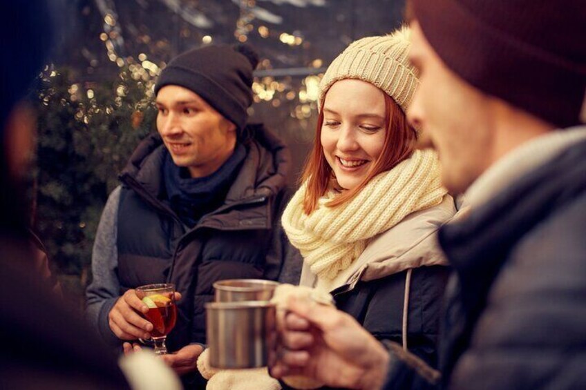 In mulled wine Veritas warming old town walk in Freiburg