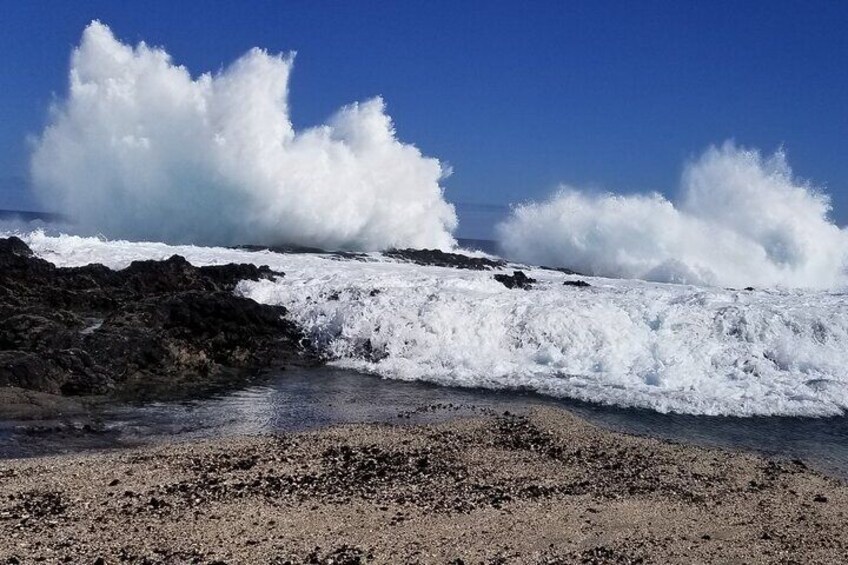 Hugh waves crashing on the shoreline