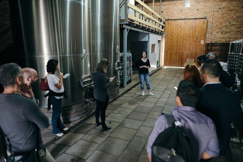 Customer group visit inside the winery.