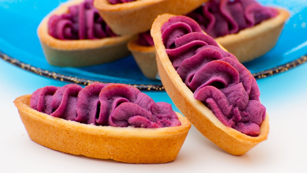 Show item 3 of 4. Cookies with purple frosting in Okanawa