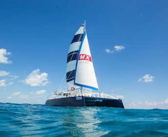 Isla Mujeres Catamaran Tour with snorkelling & private Beach Club by Xcaret