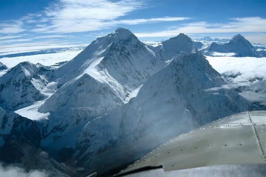 The Himalayan range as seen from the window of an aircraft during mountain flight