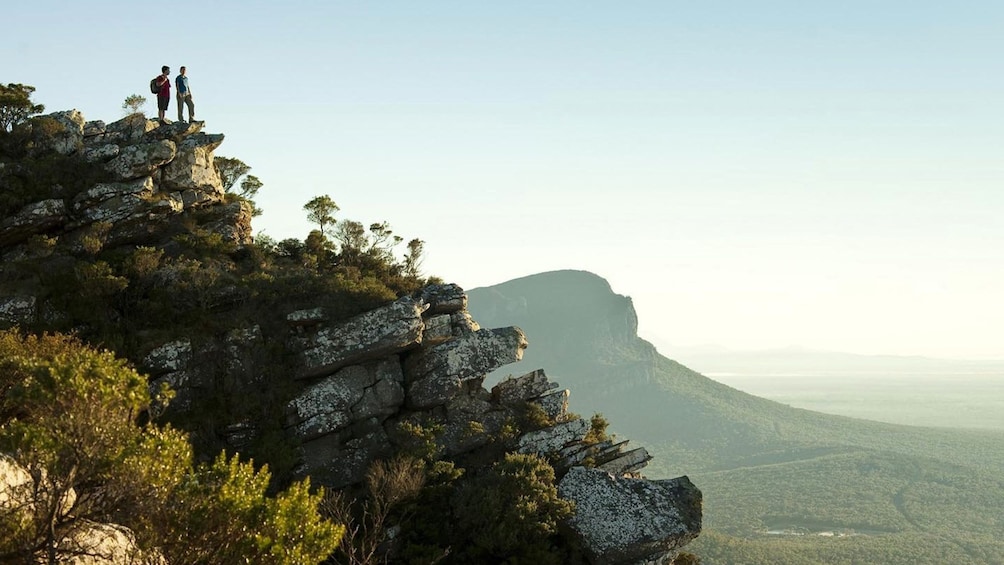 Hikers looking out at the view from mountains in Melbourne