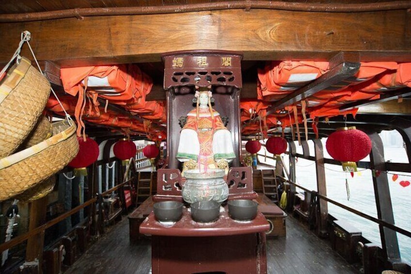The statue of Mazu is placed on the boat for blessing