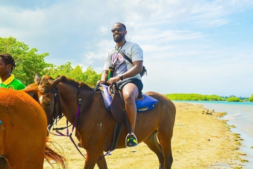 Jamaica's Ocean Horseback Bamboo Raft Adventure and Transport