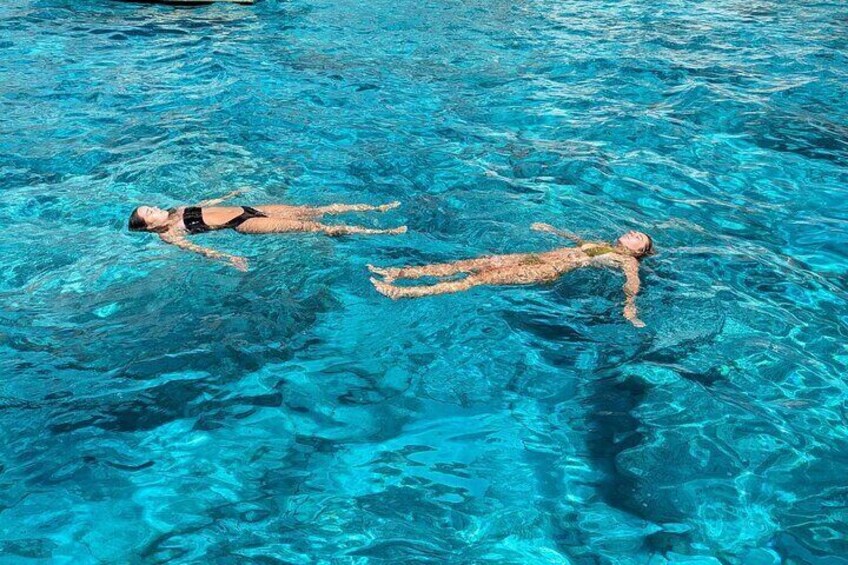 Swimming in clear blue water